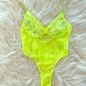 Neon green see through body suits